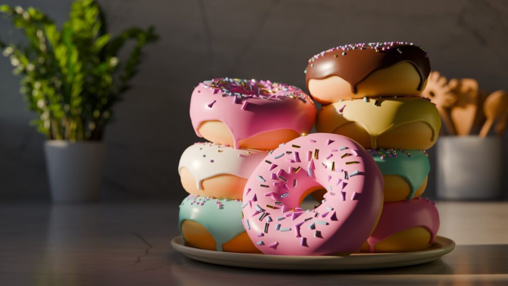 Donuts stacked on a plate in the kitchen